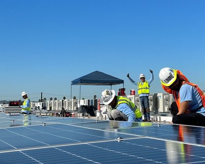 Construction crew installing commercial solar 